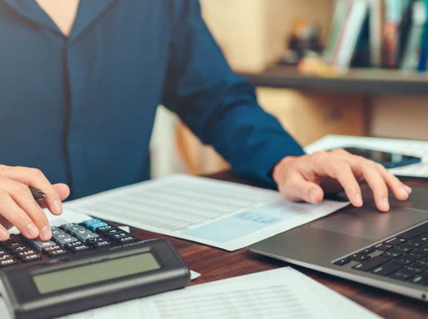 Adjuster measuring and documenting property damage