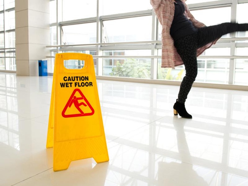 Wet floor caution sign in a commercial premises