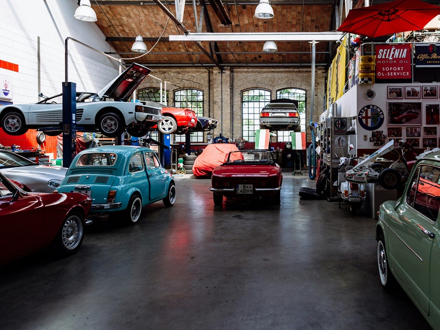Vehicles parked inside a service garage